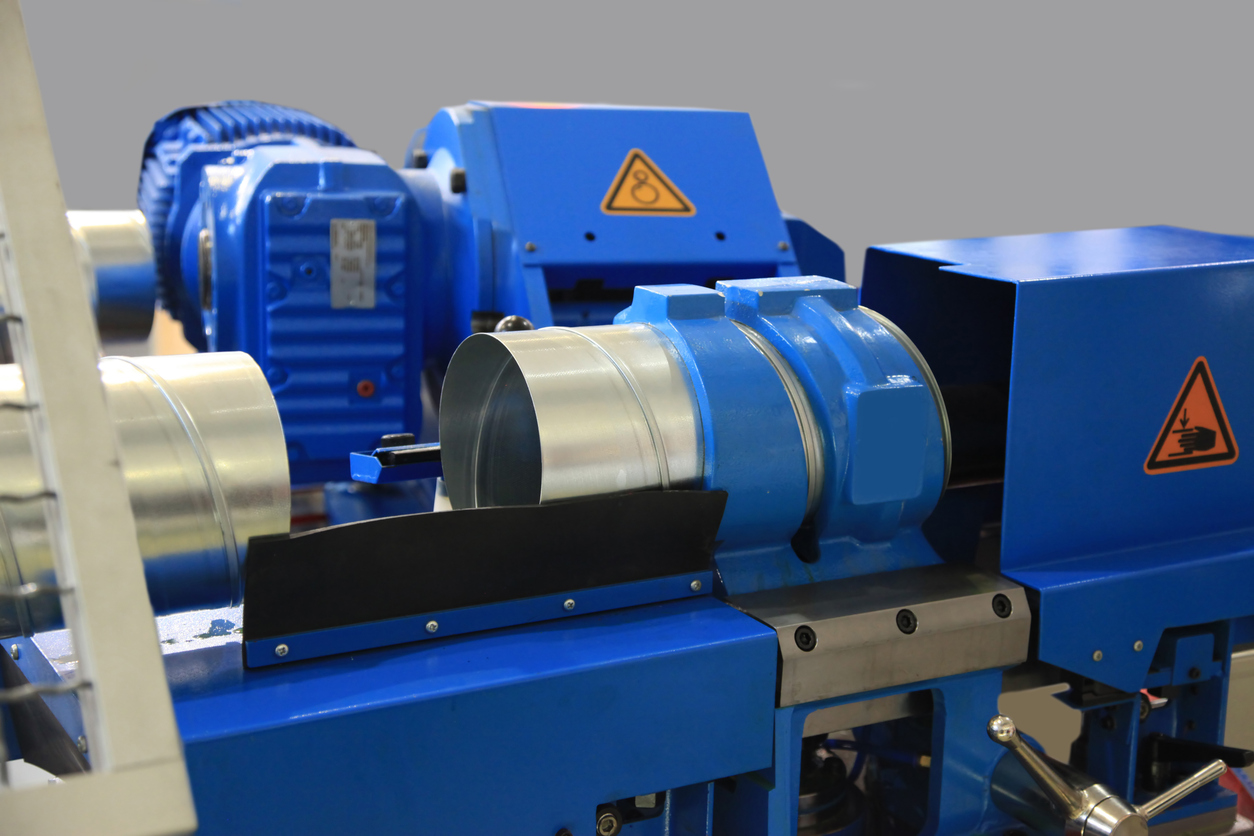 pipe beveling equipment in a machine shop